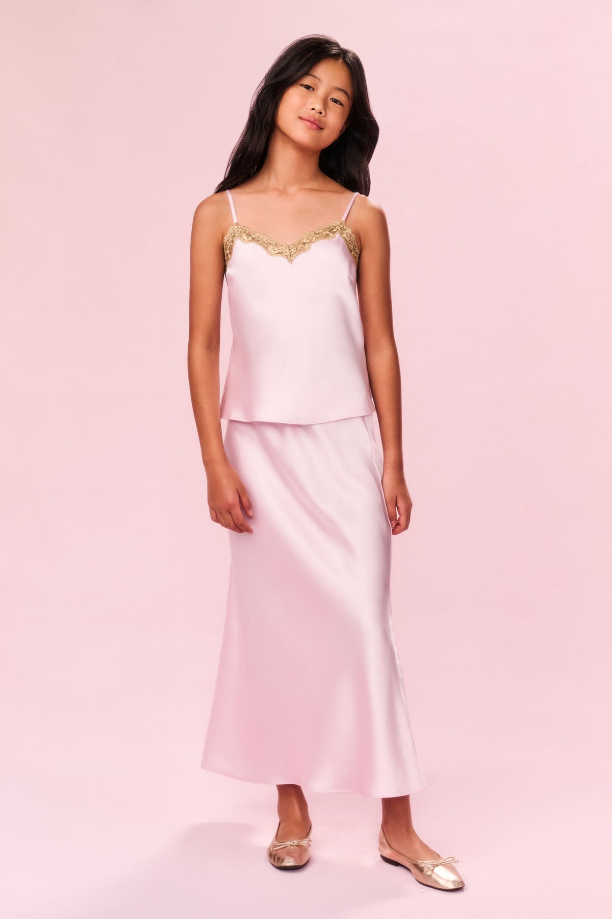 Tween satin maxi skirt in gentle rose pink, smooth drape and long ankle length.