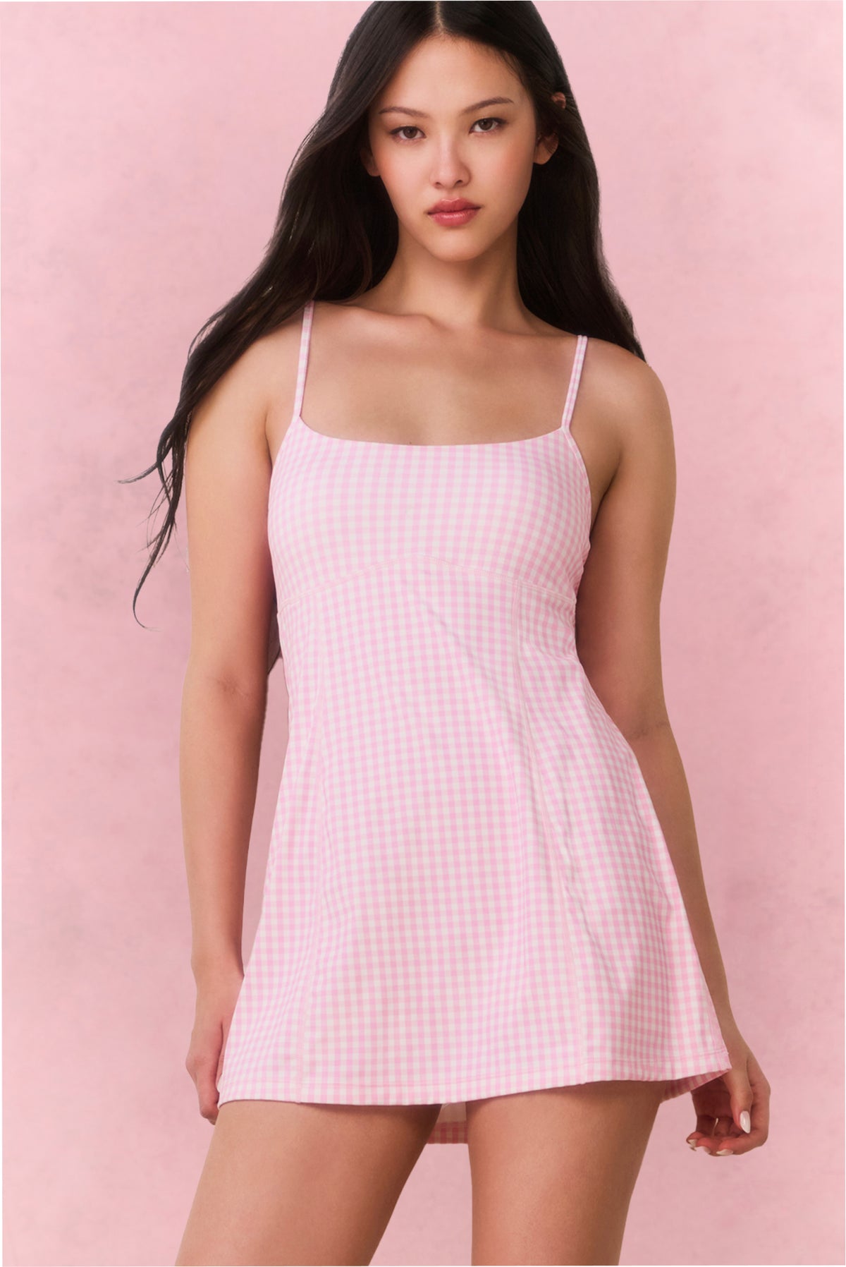 Pink gingham active dress with scoop neck, thin straps, and flared skirt