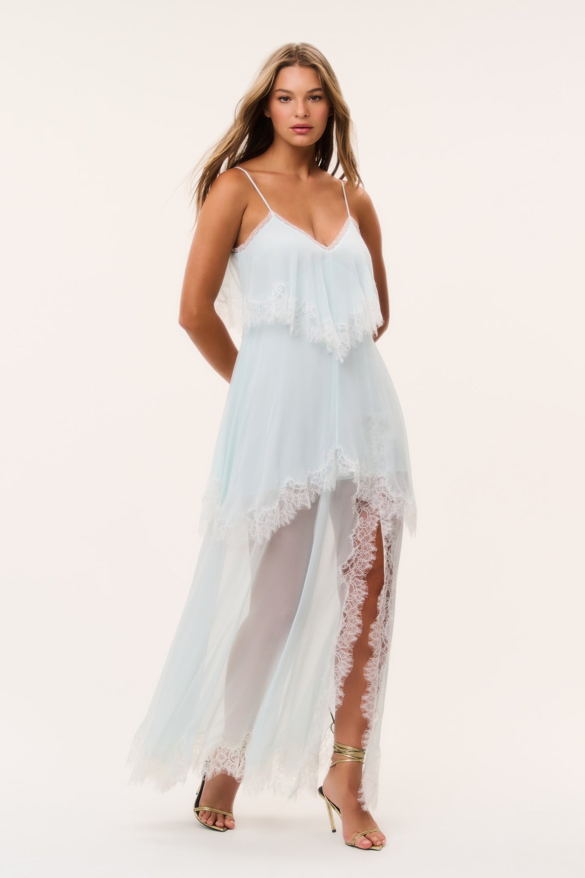 Light aqua silk chiffon maxi dress with V-neck, lace appliques, and layered ruffle hem.