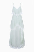 Light aqua silk chiffon maxi dress with lace tiers, fringe detail, and spaghetti straps.