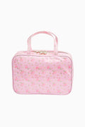Pink floral print travel box with top handle and gold clasp
