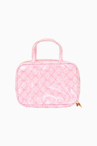 Pink printed travel box with top handle and quilted diamond pattern, zip closure