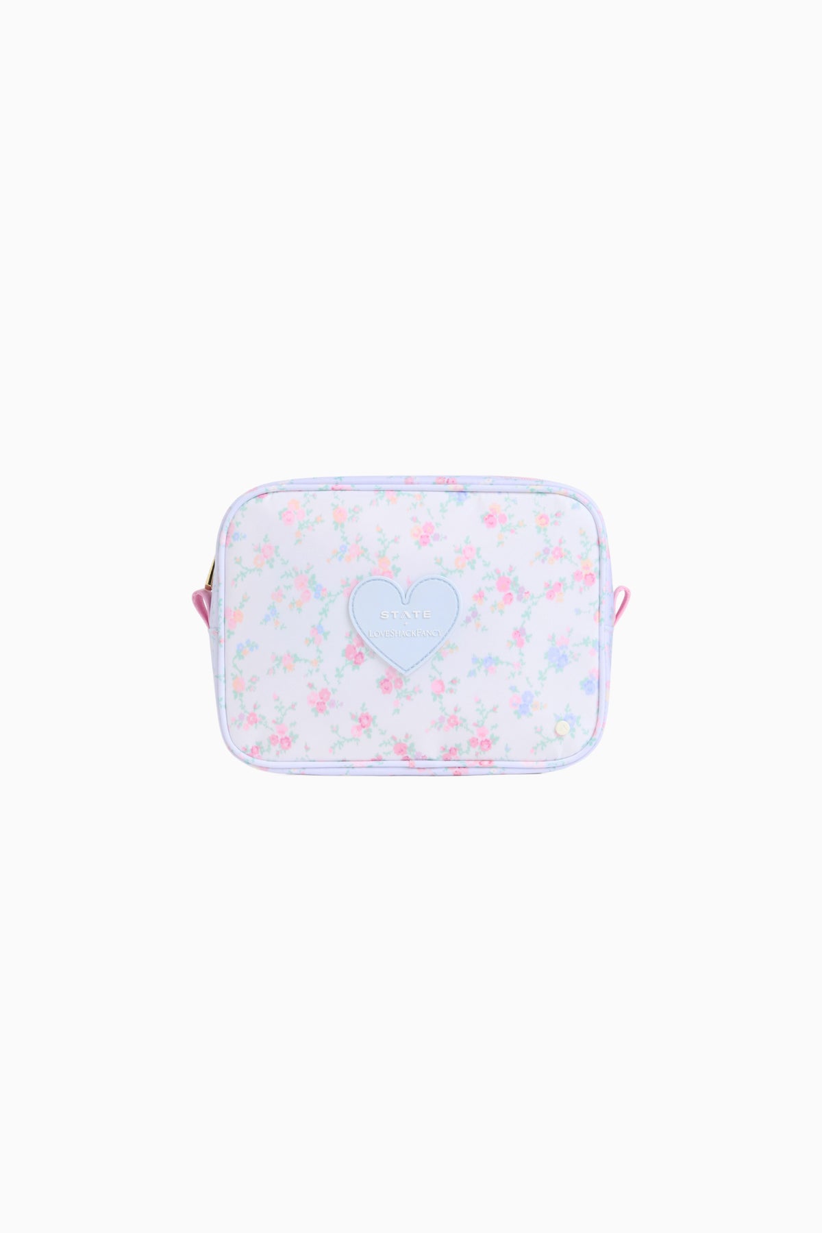 Floral zippered travel pouch with heart patch on light pink background