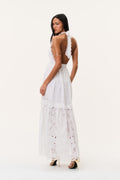 Optic white eyelet halter maxi dress from back view with open back and layered hem