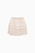 Tiered twirl skirt with pink icing print on light fabric, elastic waistband
