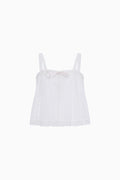 White cotton tween top with spaghetti straps, gathered bodice, ruffled hem