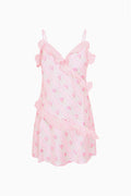 Light pink floral mini dress on hanger with V neckline and layered ruffle tiers