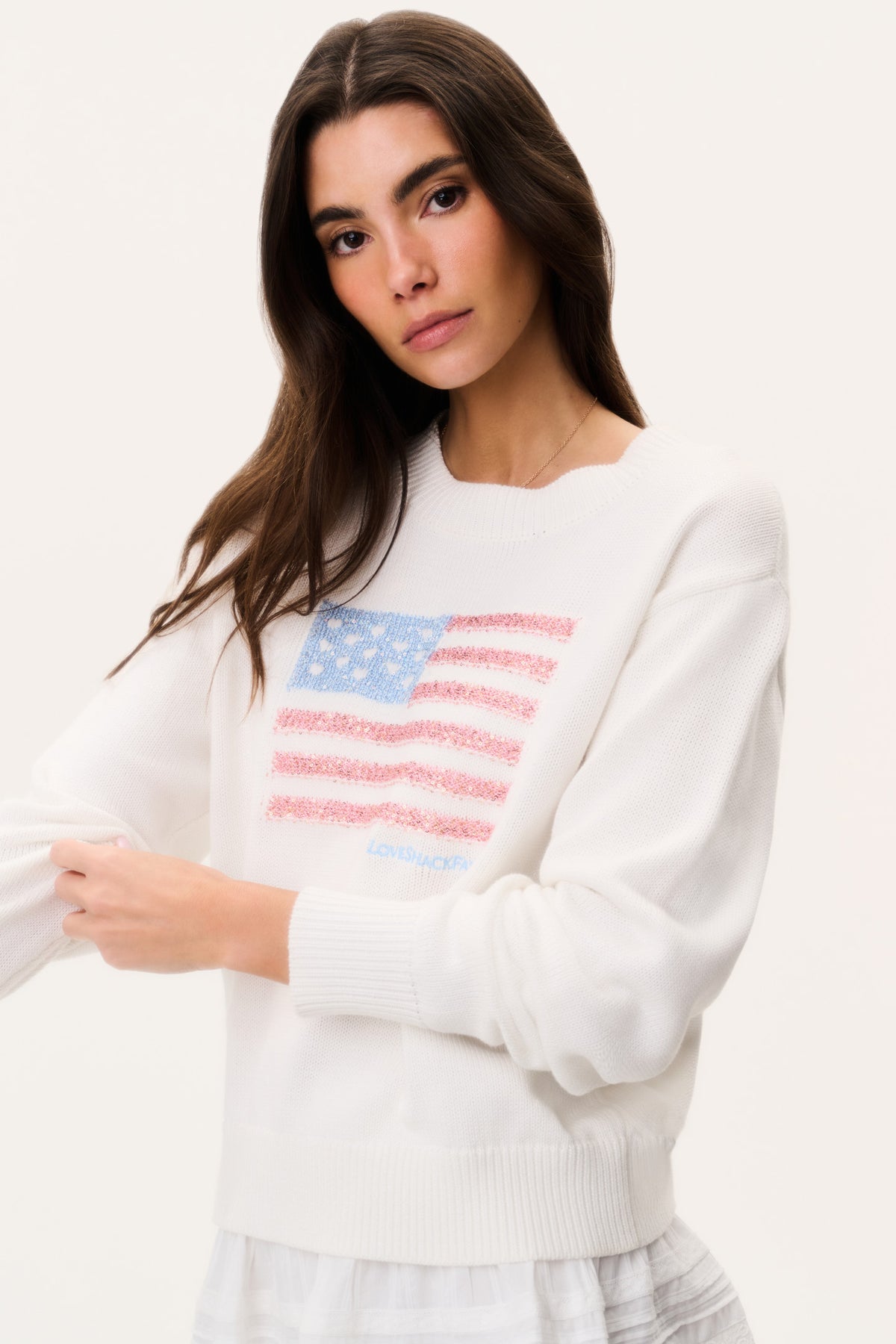 White knit pullover sweater with sparkling Americana flag front print