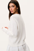 White knit pullover sweater, crew neck with ribbed cuffs and hem