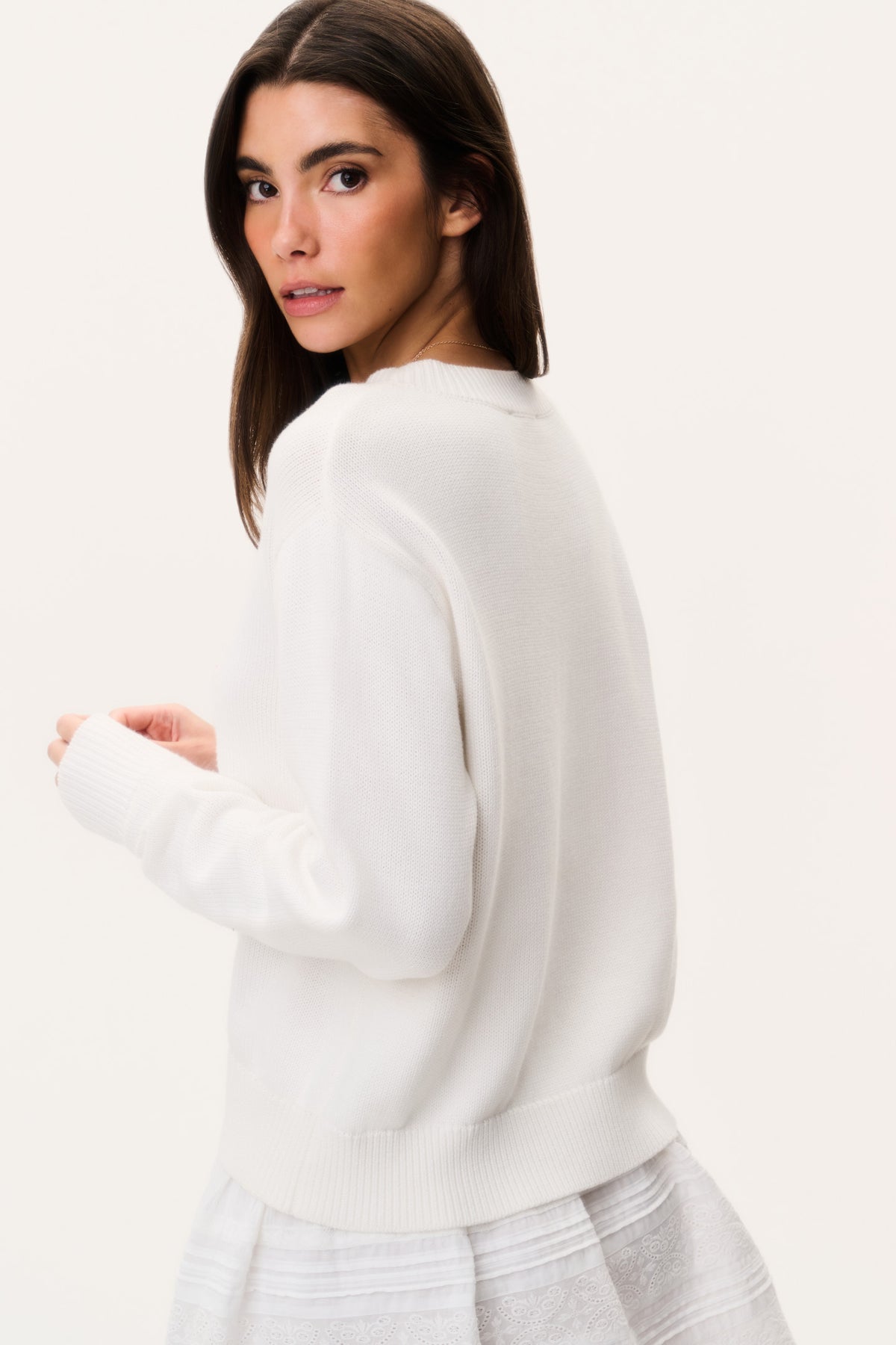 White knit pullover sweater, crew neck with ribbed cuffs and hem