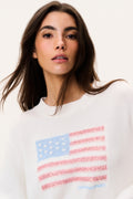 White knit pullover sweater with close-up sparkling flag graphic