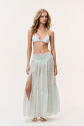 Umber cotton cover-up skirt in light celadon with small pattern, tiered maxi length.