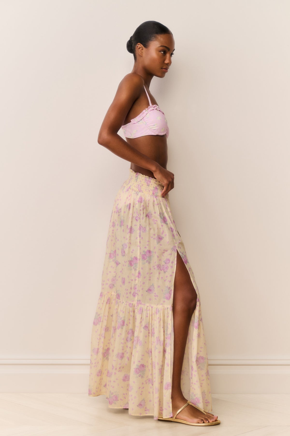Light floral maxi skirt with tiered ruffle hem and high side slit