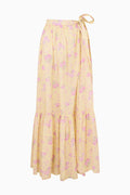 Floral maxi skirt with tiered ruffles, elastic waist, and bow tie