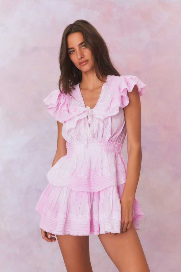 Peony pink mini dress with ruffled flutter sleeves and tiered bodice