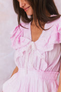 Peony pink hand-dyed dress bodice detail with gathered waist and ruffle trim