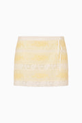 Lemon cotton Victorian mini skirt with lace trim and sheer paneling
