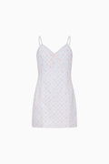 Floral cotton mini dress with spaghetti straps, V-neck, and light pink flower print