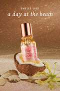 Single mini hair and body mist bottle with rose-gold cap, gold glass, pink floral label