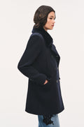 Navy peacoat with faux fur collar, long sleeves, side profile