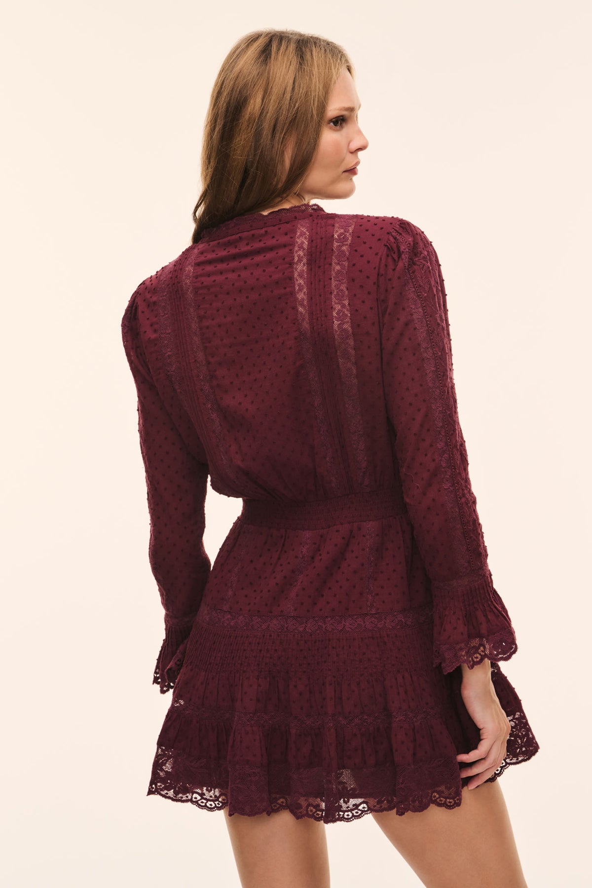 Faded merlot cotton Swiss dot mini dress with long sleeves and back yoke detail