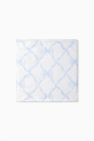 Blue printed wash cloth with a geometric lattice pattern