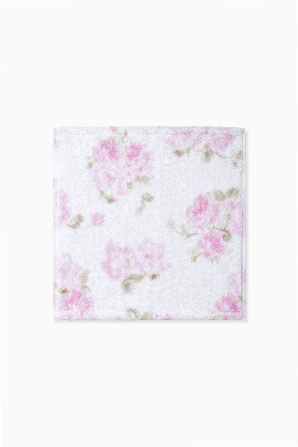 Pink printed wash cloth with a soft floral pattern