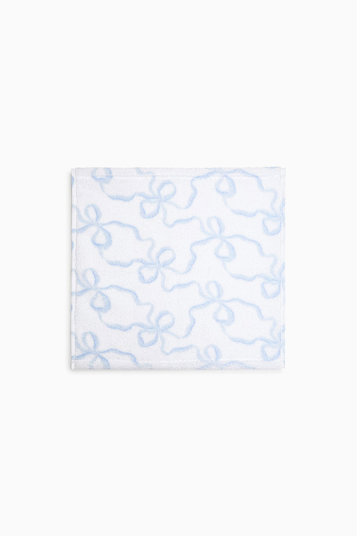Cotton wash cloth, light blue with ornate swirl pattern