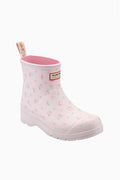 Women’s short rain boots in light purple with allover floral print, front angled view