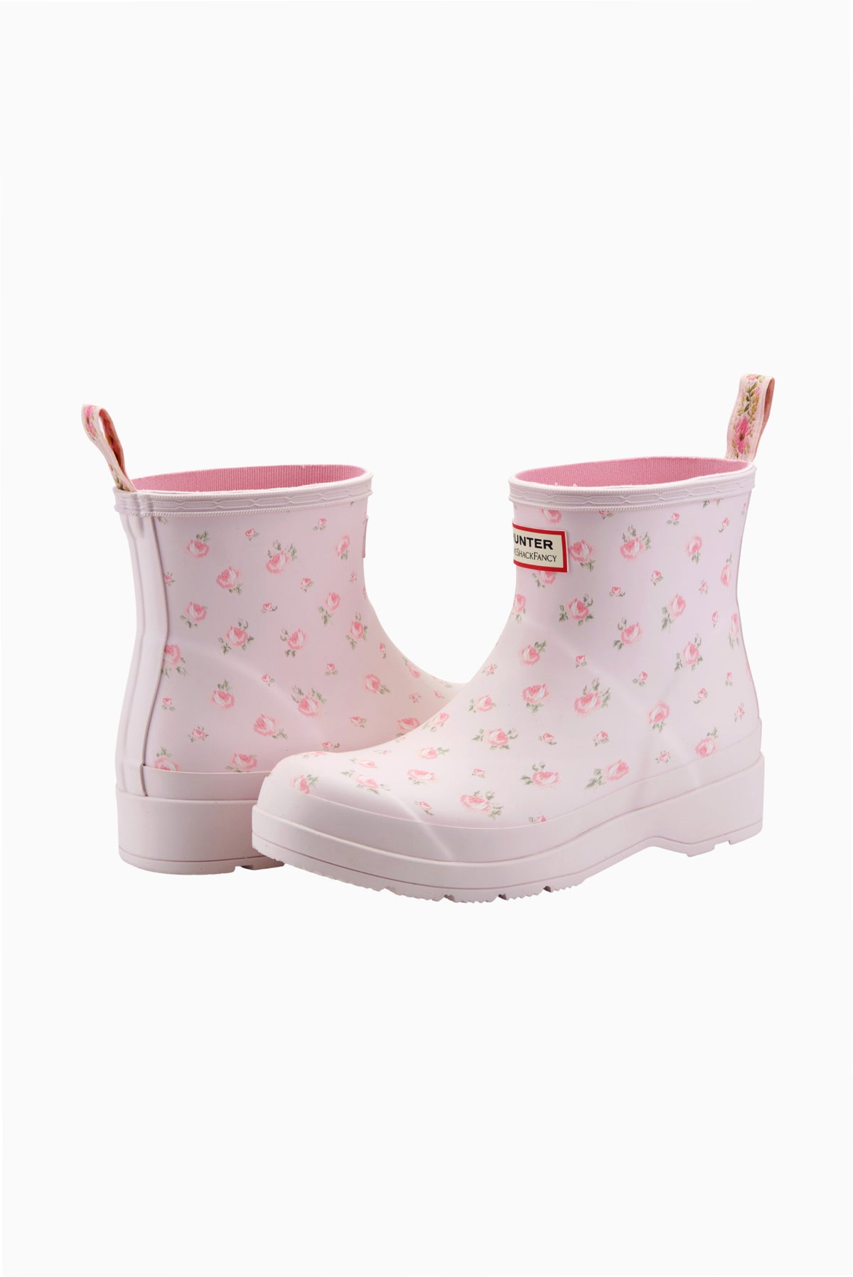 Pair of women’s short rain boots in light purple with pink floral print, side-by-side