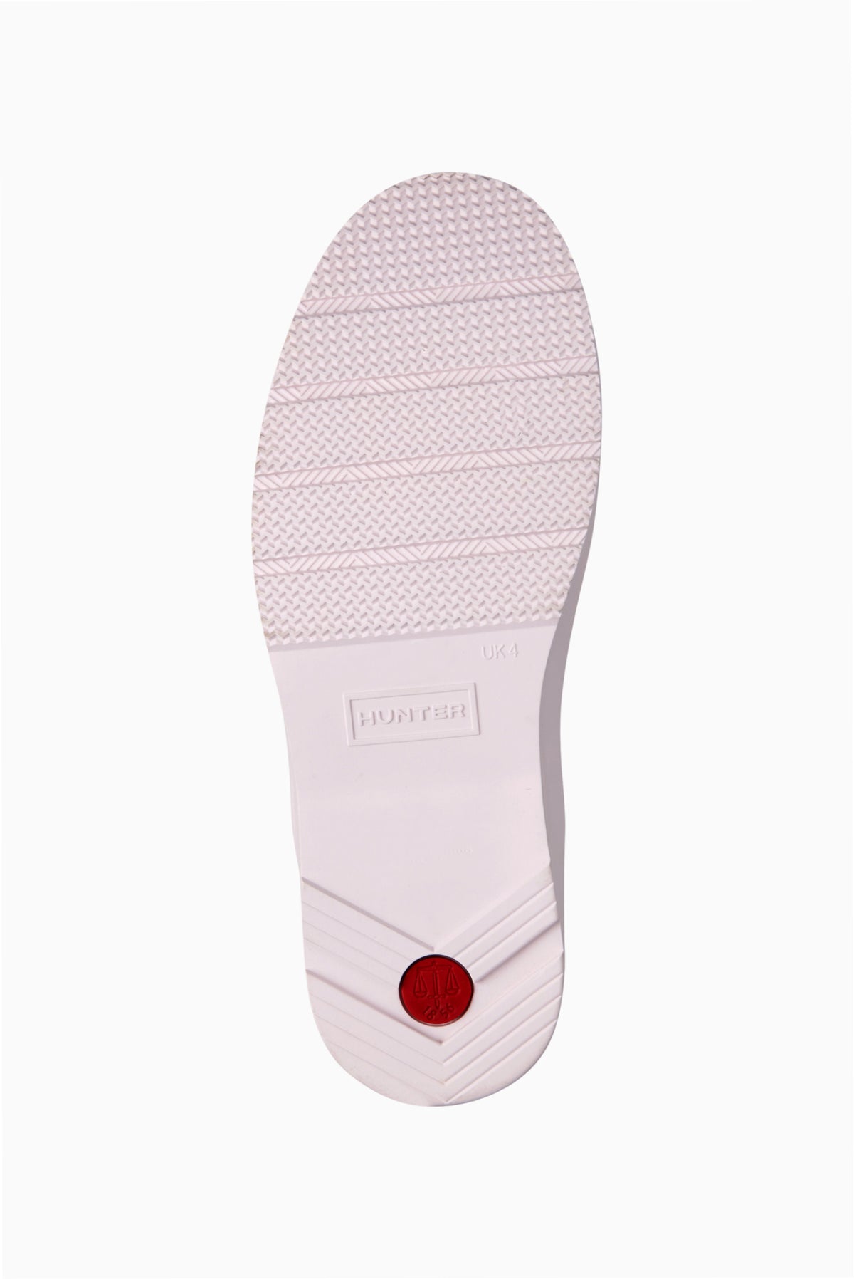 Light purple rain boot outsole with textured tread and brand label