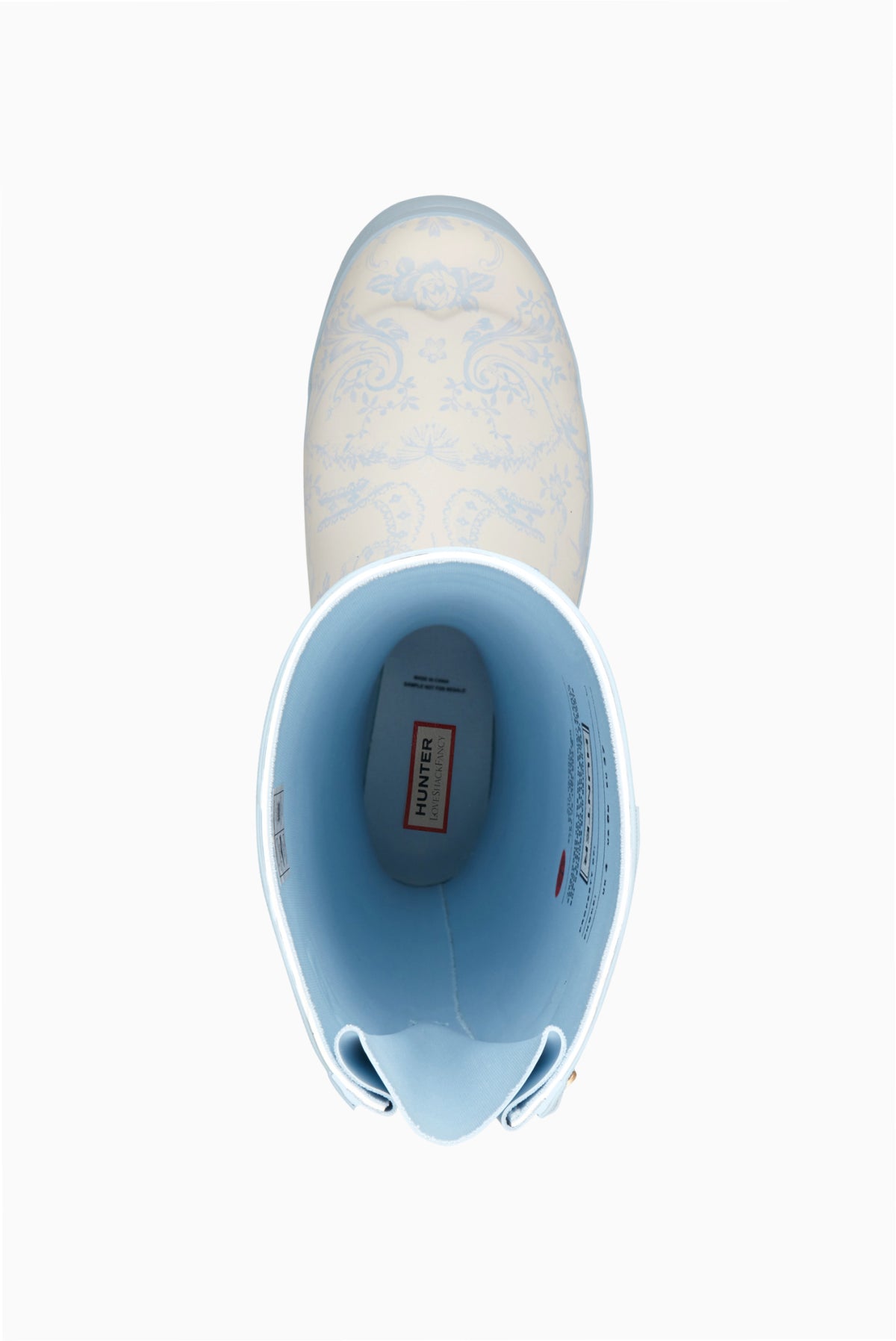 Hunter x LoveShackFancy tall rain boot opening view, light blue lining and pull-on tab