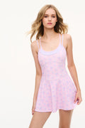 Light pink sleeveless floral skater dress with thin straps and scoop neckline.