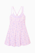 Light pink floral skater dress with thin spaghetti straps and flared skirt (flat lay).