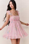Pink floral chiffon mini dress with off-shoulder neckline, flutter sleeves, and tiered skirt