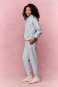 Tween light blue floral sweatpants, side view with elastic cuffed ankles