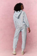 Tween light blue floral sweatpants with drawstring waist and tapered cuffs