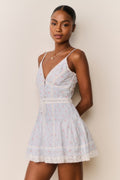 Floral cotton mini dress with lace trim, spaghetti straps and V-neck buttons