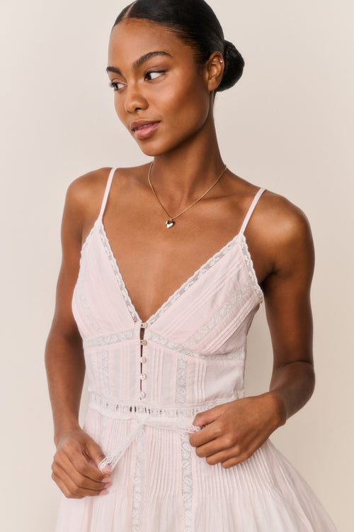 Light pink cotton mini dress, V-neck bodice with button details, lace trim