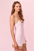 Light pink slip dress with lace V-neck, gold scalloped hem, and thin straps
