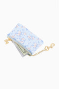 Light blue floral keychain wallet, gold chain strap, zippered pouch with gold pull