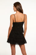 Black lace mini skirt with back spaghetti straps and scalloped hem