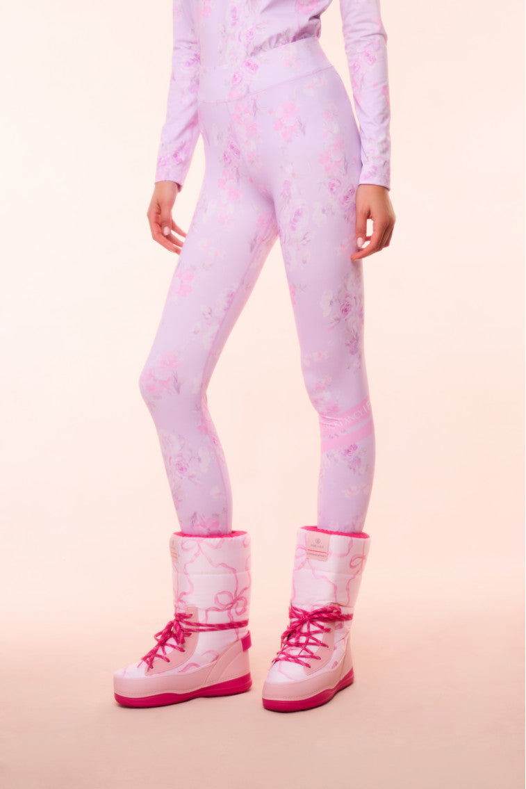 Pink floral-print leggings showing full legs and elastic cuffs at the ankles.