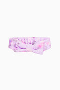 Purple-pink bow face-wash headband with padded knot and gathered band