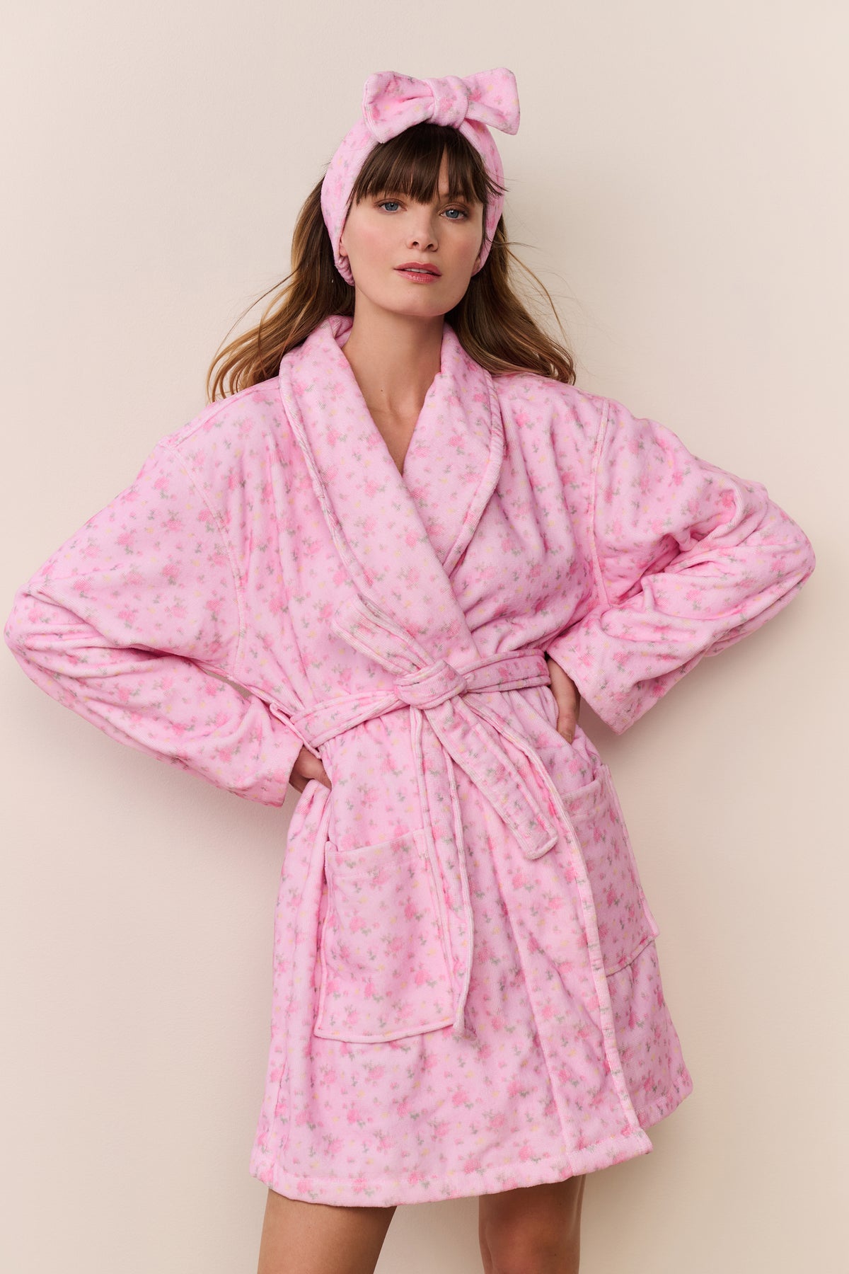 Pink cotton bath robe with wide sleeves, hood, tie belt and small floral print