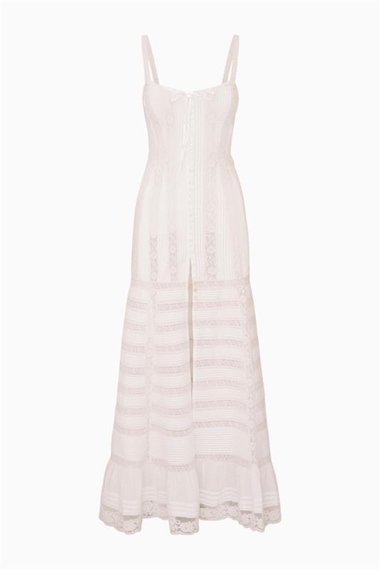 White cotton Victorian maxi dress with lace-textured panels and tiered hem