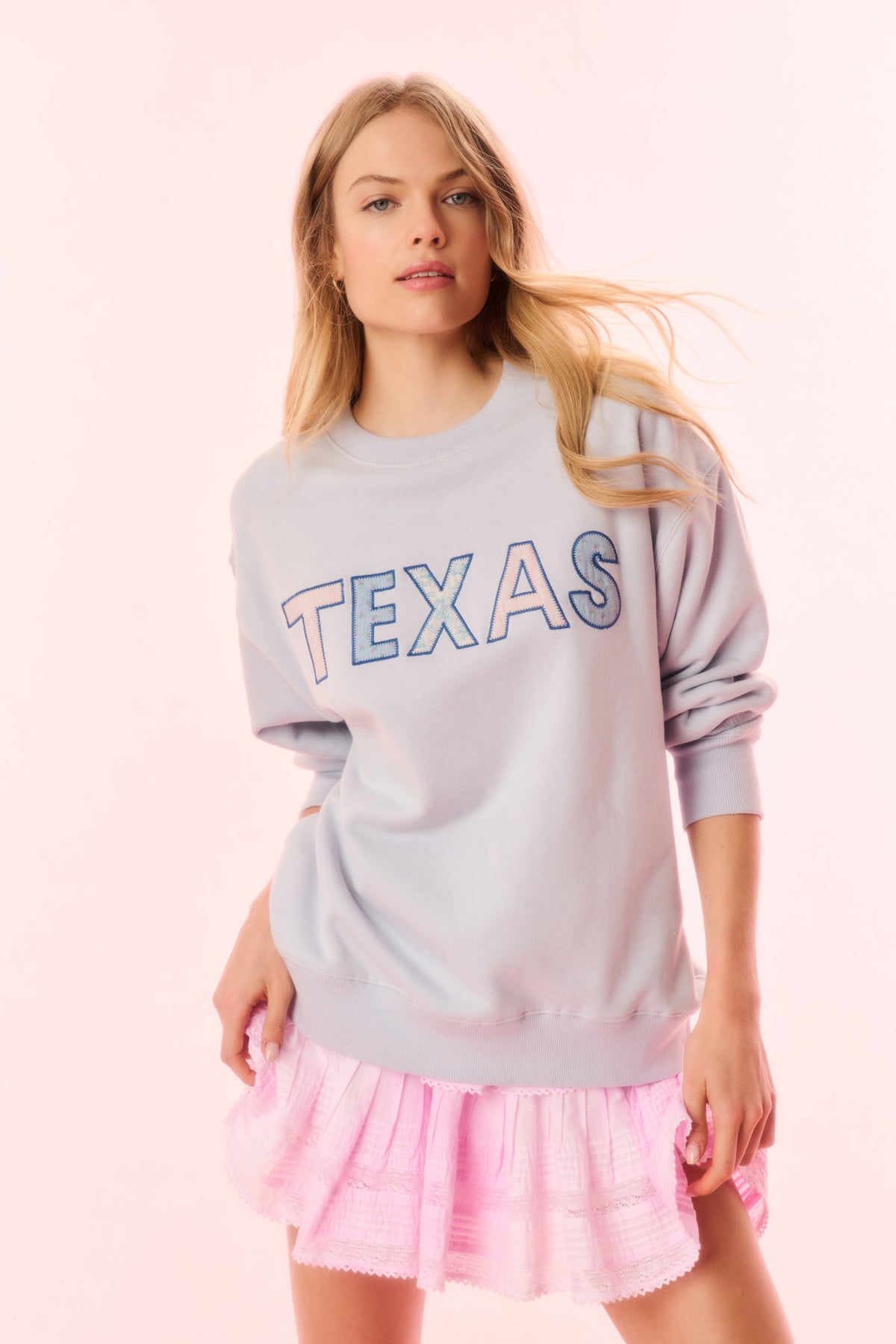 Location pullover sweatshirt in light blue with TEXAS graphic, crewneck