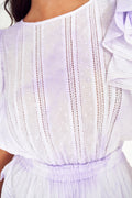 Lavender mini dress bodice close-up with vertical embroidered stripes and ruffle shoulder detail