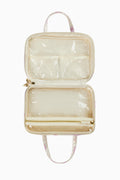 Gold glossy travel box with top handle, open two-compartment interior