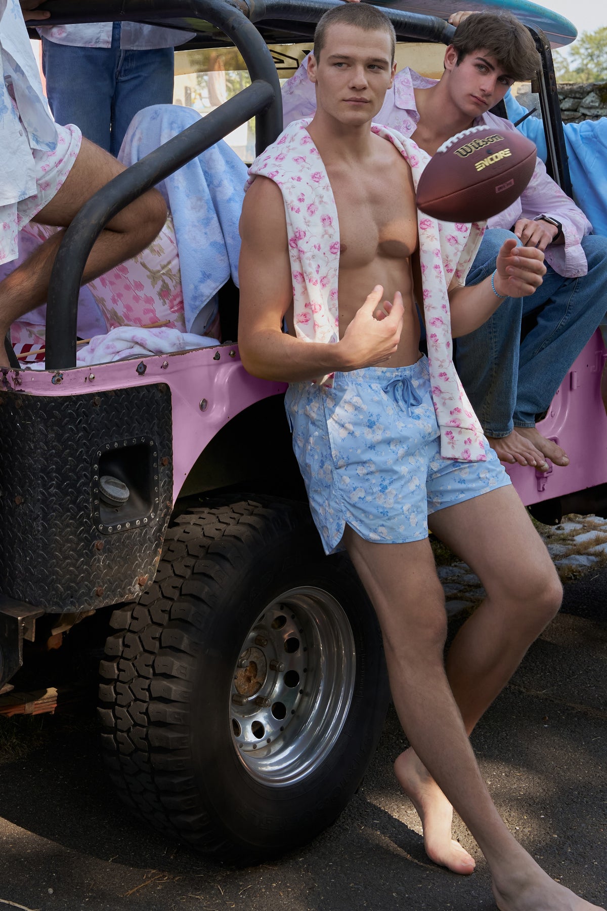 Light blue printed swim shorts with drawstring waist tie and relaxed fit